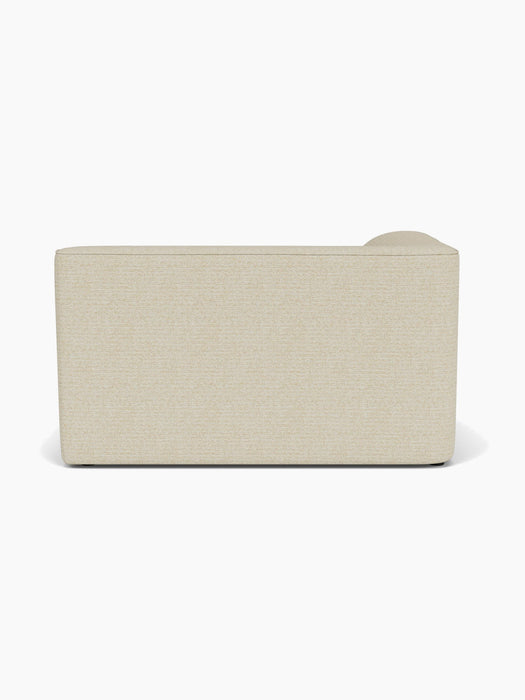 Back view of the Eave Modular Sofa, 96, Corner 144, upholstered in a light beige fabric, shown against a white background.