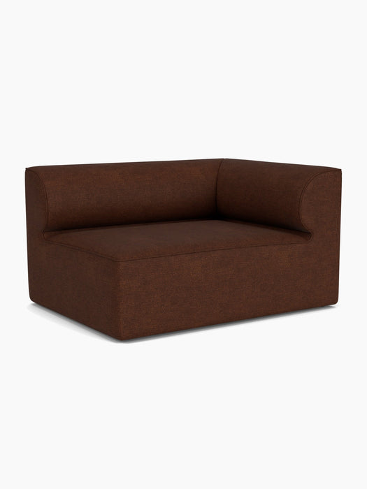 An angled view of the Eave Modular Sofa, 96, Corner 144, a corner module upholstered in a textured brown bouclé fabric.