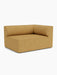 Eave Modular Sofa, 96, Corner 144 right module in a mustard yellow textured fabric, shown at an angle on a white background.