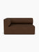 Front view of the Eave Modular Sofa, 96, Corner 144, featuring a curved backrest and dark brown Audo Bouclé 07 upholstery.