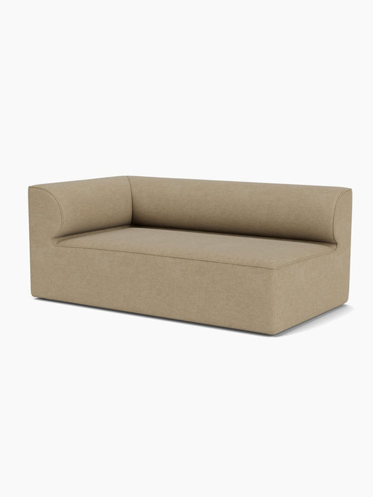 An Eave Modular Sofa, 96, Corner 192, in a light brown bouclé fabric, viewed from an angle against a plain white background.