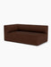 Angled view of the Eave Modular Sofa, 96, Corner 192. The left-corner piece is upholstered in a dark brown bouclé fabric.