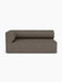 Front view of the Eave Modular Sofa, 96, Corner 192, a left-corner piece with dark brown bouclé and a low, curved back.