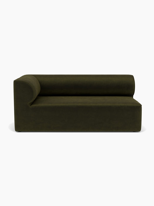 Front view of the Eave Modular Sofa, 96, Corner 192 Left, upholstered in dark green Champion 35 fabric on a white background.
