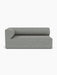 Front view of the Eave Modular Sofa, 96, Corner 192 Left piece, upholstered in a light grey Safire 12 fabric.