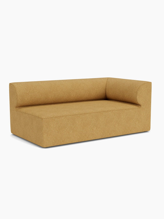 The Eave Modular Sofa, 96, Corner 192, in a textured mustard yellow fabric, shown from an angle against a white background.