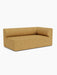 The Eave Modular Sofa, 96, Corner 192, in a textured mustard yellow fabric, shown from an angle against a white background.
