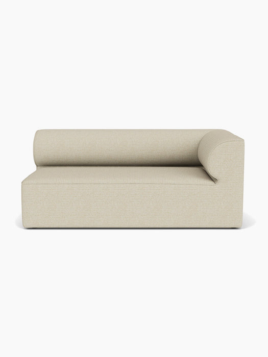 A front-on view of the Eave Modular Sofa, 96, Corner 192 right module, upholstered in a light, textured beige fabric.