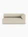 A front-on view of the Eave Modular Sofa, 96, Corner 192 right module, upholstered in a light, textured beige fabric.