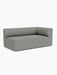 Angled view of the Eave Modular Sofa, 96, Corner 192, a right-corner module upholstered in grey Safire 12 textured fabric.