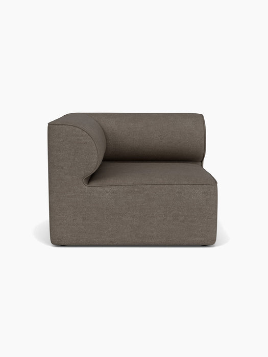 Eave Modular Sofa, 96, Corner, left module, shown from the front. The piece is upholstered in a textured, brown bouclé.