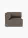Eave Modular Sofa, 96, Corner, left module, shown from the front. The piece is upholstered in a textured, brown bouclé.