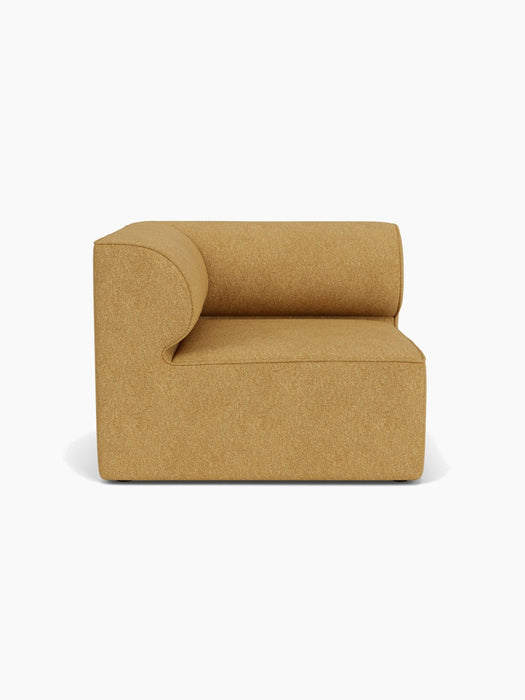 The Eave Modular Sofa, 96, Corner Left, upholstered in a textured moss fabric, shown from the front on a white background.