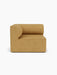 The Eave Modular Sofa, 96, Corner Left, upholstered in a textured moss fabric, shown from the front on a white background.