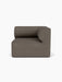 A front-on photograph of the Eave Modular Sofa 96, Corner Right unit, upholstered in a dark brown Audo Bouclé 16 fabric.