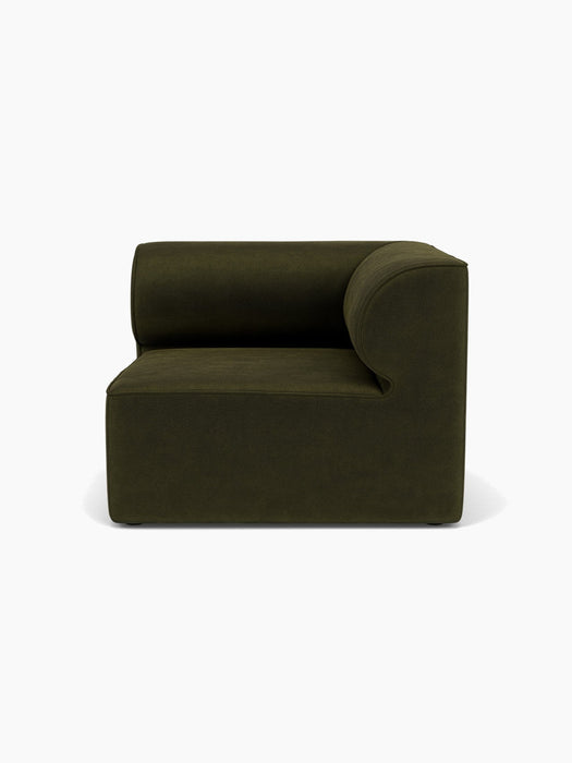 A front-facing view of the Eave Modular Sofa's right corner module, 96 cm deep, in a dark green textured Champion 035 fabric.