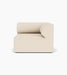 The Eave Modular Sofa, 96, Corner unit, seen from the front. It features a blocky base and a curved armrest in light fabric.
