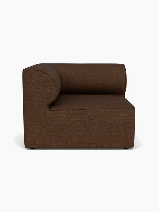 A straight-on view of the Eave Modular Sofa 96 Left Corner module, upholstered in a textured brown Audo Bouclé 07 fabric.