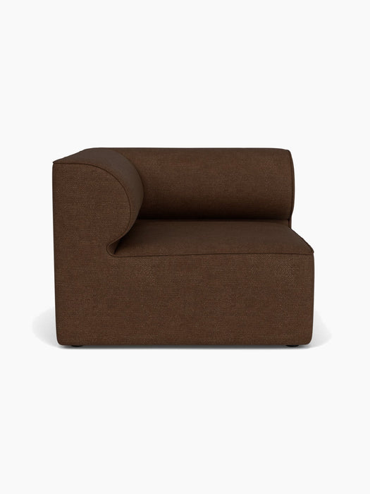 A straight-on view of the Eave Modular Sofa 96 Left Corner module, upholstered in a textured brown Audo Bouclé 07 fabric.