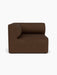 A straight-on view of the Eave Modular Sofa 96 Left Corner module, upholstered in a textured brown Audo Bouclé 07 fabric.