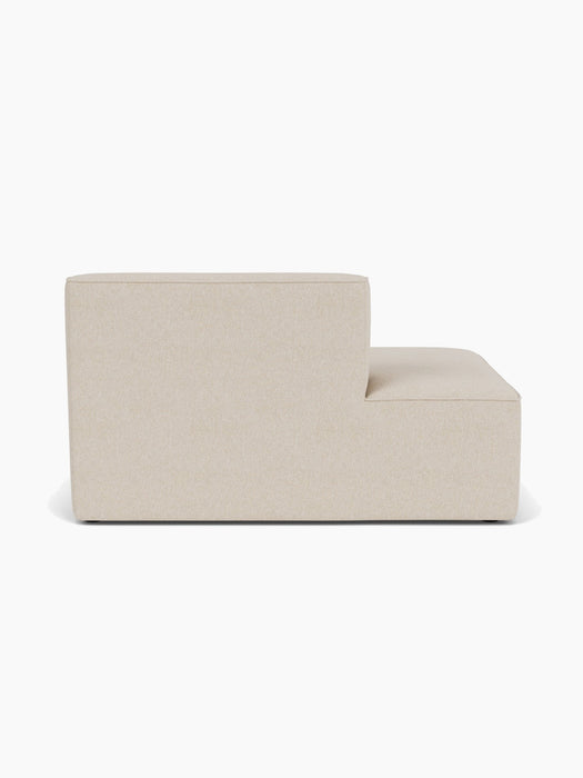 A back view of the Eave Modular Sofa, 96, Open End, a module upholstered in a light, textured fabric on a white background.