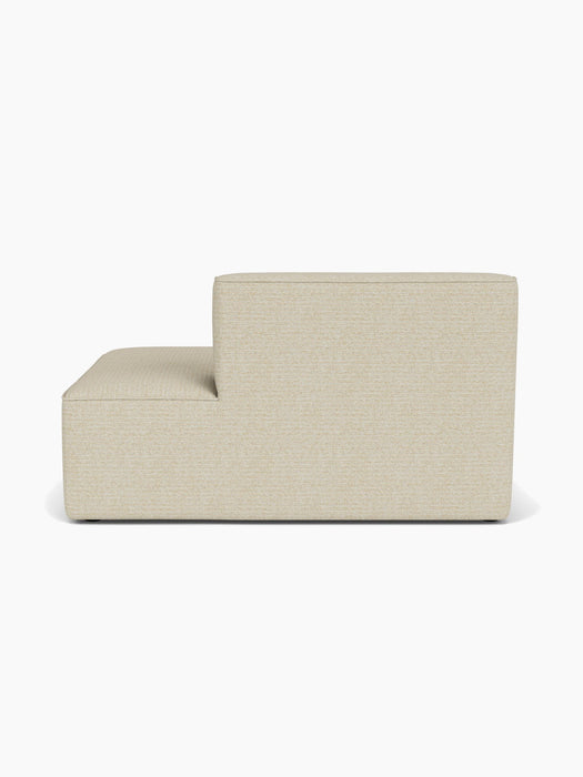 Back view of the Eave Modular Sofa, 96, Open End 144 upholstered in a light beige Savanna 202 fabric, on a white background.