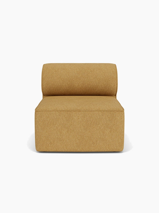 A front view of the Eave Modular Sofa, 96, Open Section, an armless module upholstered in a textured, mustard-yellow fabric.