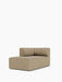 An angled view of the Eave Seamline Modular Sofa Chaise Longue. The piece is upholstered in a light brown, textured fabric.