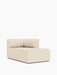 An angled view of the Eave Seamline Modular Sofa, 86, Chaise Longue in a light-coloured fabric against a white background.
