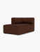 A three-quarter view of the Eave Seamline Modular Sofa's left-corner chaise longue module in a textured, brown bouclé fabric.