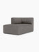 Three-quarter view of Eave Seamline Modular Sofa, 86, Chaise Longue in dark grey bouclé fabric on a white background.