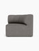 A side-on studio shot of the Eave Seamline Modular Sofa, 86, Concave, Corner, in a textured grey Audo Bouclé 16 fabric.