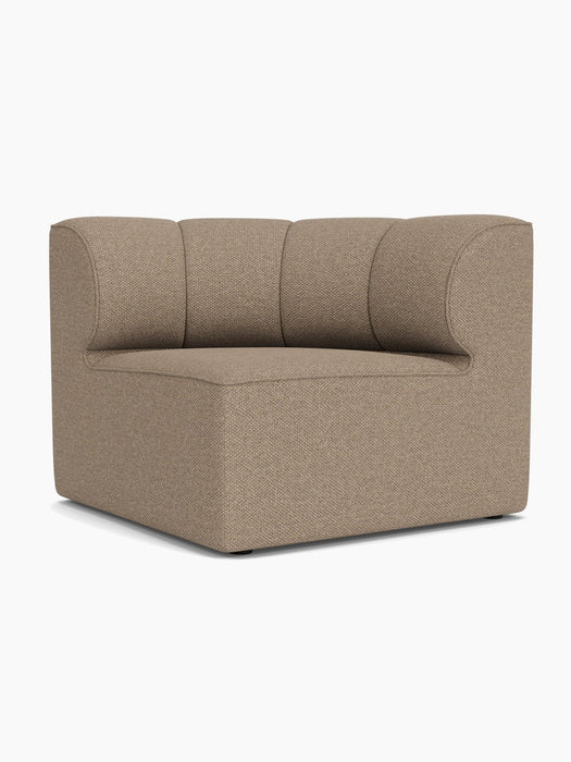 Angled view of the Eave Seamline Modular Sofa, 86, Concave, Corner in light brown textured fabric on a white background.