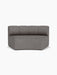 A front view of the Eave Seamline Modular Sofa, 86, Concave, Open Section, upholstered in a grey textured Audo Bouclé 16.