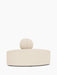 Eave Seamline Modular Sofa, Convex, Corner piece in a light bouclé fabric, with its curved seat and round backrest.