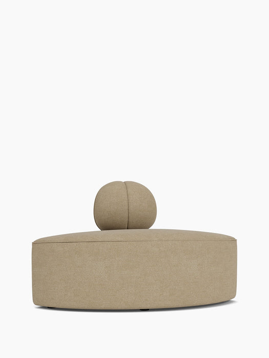 Back view of the Eave Seamline Modular Sofa, 86, Convex, Corner piece in a beige textured fabric against a white background.