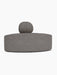A side profile of the Eave Seamline Modular Sofa convex corner piece, upholstered in a textured grey Audo Bouclé fabric.