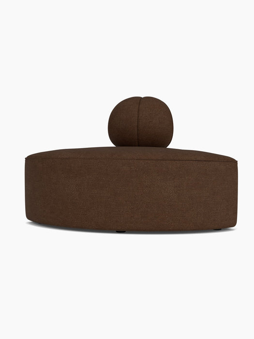 Front view of the Eave Seamline Modular Sofa, 86, Convex, Corner module, upholstered in dark brown Audo Bouclé fabric.