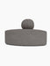 Back view of the Eave Seamline Modular Sofa, 86, Convex, Corner module in a textured grey Audo Bouclé fabric.
