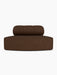 Front view of the Eave Seamline Modular Sofa, a convex open section upholstered in textured, dark brown Audo Bouclé fabric.
