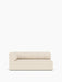 Front view of the Eave Seamline Modular Sofa corner piece in a light fabric, showing its channel-tufted back and rounded arm.