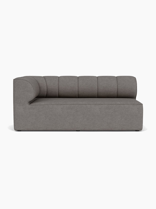 Front view of the Eave Seamline Modular Sofa, 86, Corner 172 in grey bouclé, featuring a curved left arm and seamline back.