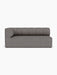 Front view of the Eave Seamline Modular Sofa, 86, Corner 172 in grey bouclé, featuring a curved left arm and seamline back.