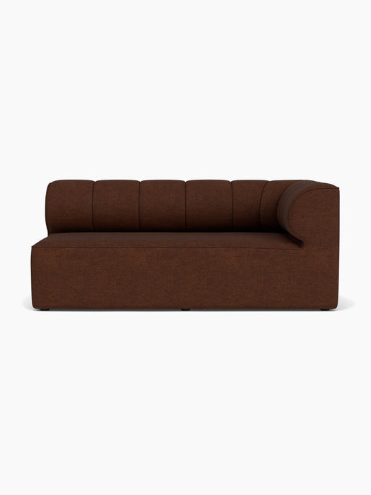 Front view of the Eave Seamline Modular Sofa, 86, Corner 172, in a dark brown bouclé fabric, against a white background.