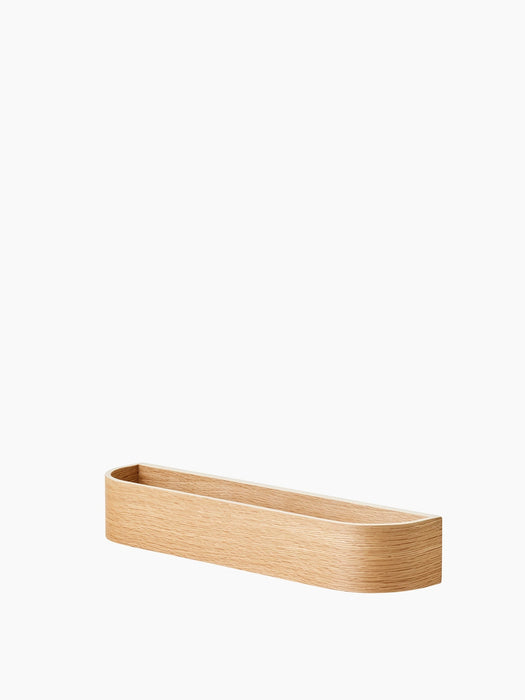 Epoch Rack 50 in Natural Oak, minimalist wooden wall shelf with curved design, shown at an angle on a white background.