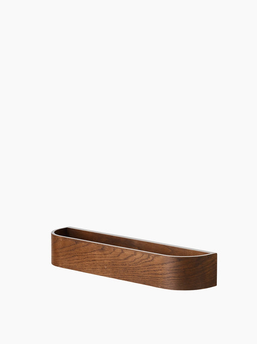 Angled view of the Epoch Rack 50 in Dark Stained Oak, wooden wall shelf with rounded ends, against a white background.