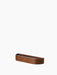 A low-angle view of the Epoch Shelf 50. The minimalist, curved wall shelf has a dark stained wood finish.