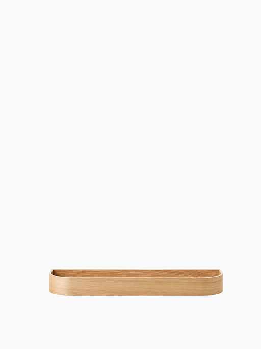 Epoch Shelf 79, a long shallow wall shelf in natural oak with a high rim and rounded corners, against a white background.