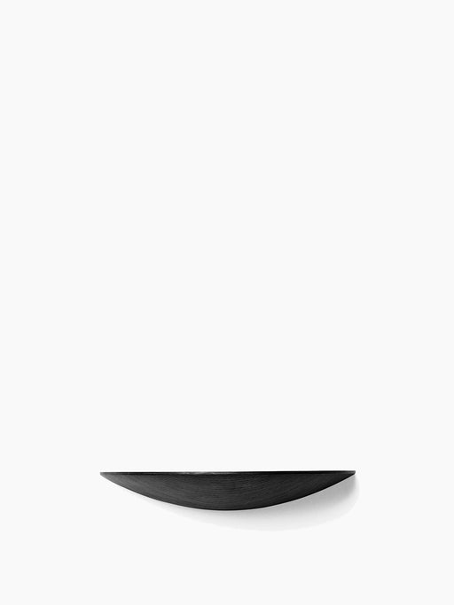 The medium-sized Gridy Fungi Shelf in black, made of wood with a visible grain, floats against a stark white wall.