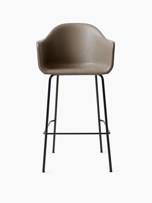 The Harbour Bar Chair, Upholstered, in taupe Dakar leather with a black steel base, shown from the front.